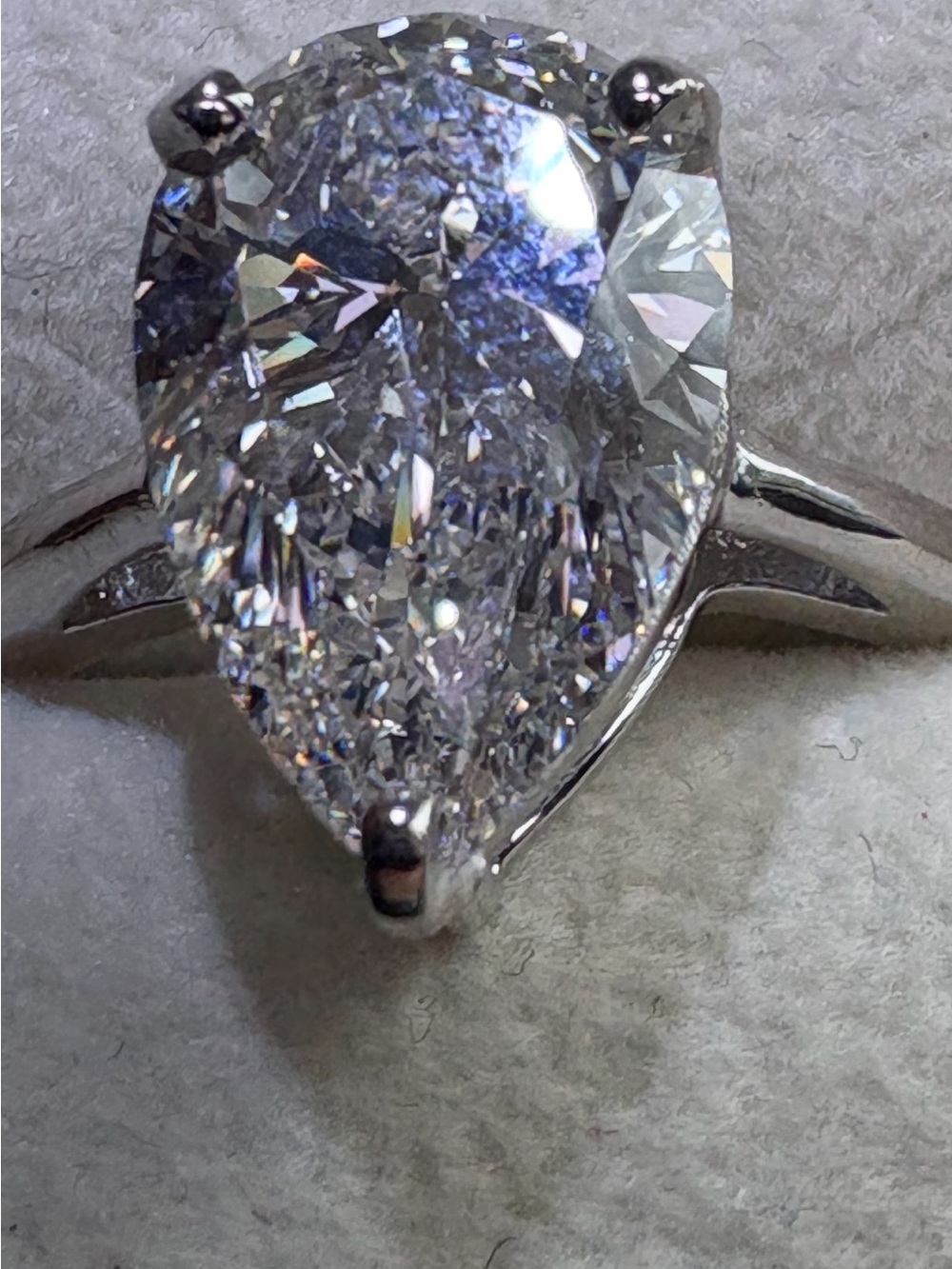 14 kt gold pear lab diamond solitaire with IGI papers.